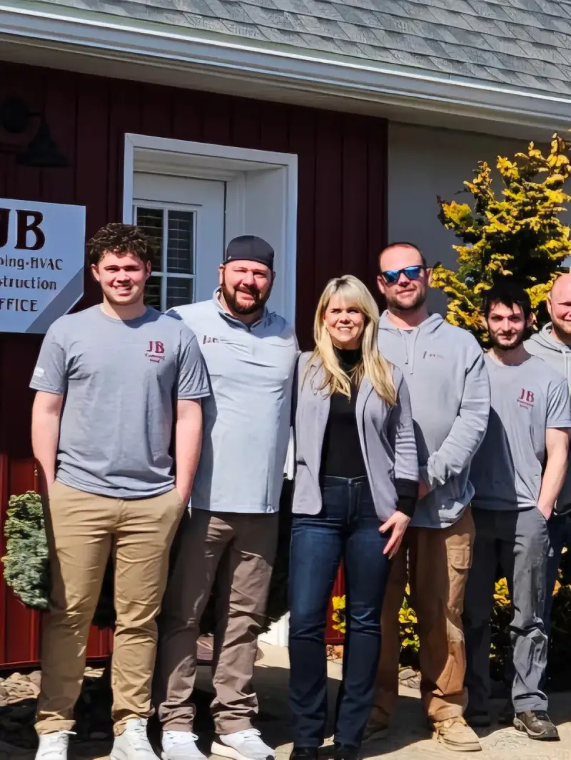 The JB Plumbing HVAC and Construction crew gathered outside the Reading PA office